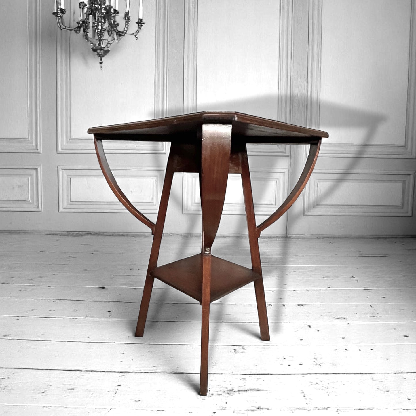 An arts and crafts / early modernist mahogany two-tiered occasional table c.1910.