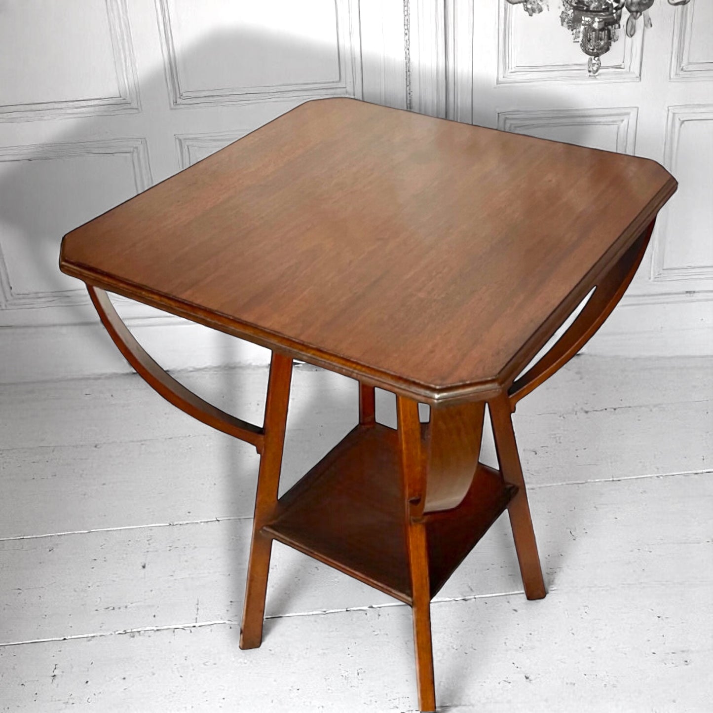 An arts and crafts / early modernist mahogany two-tiered occasional table c.1910.