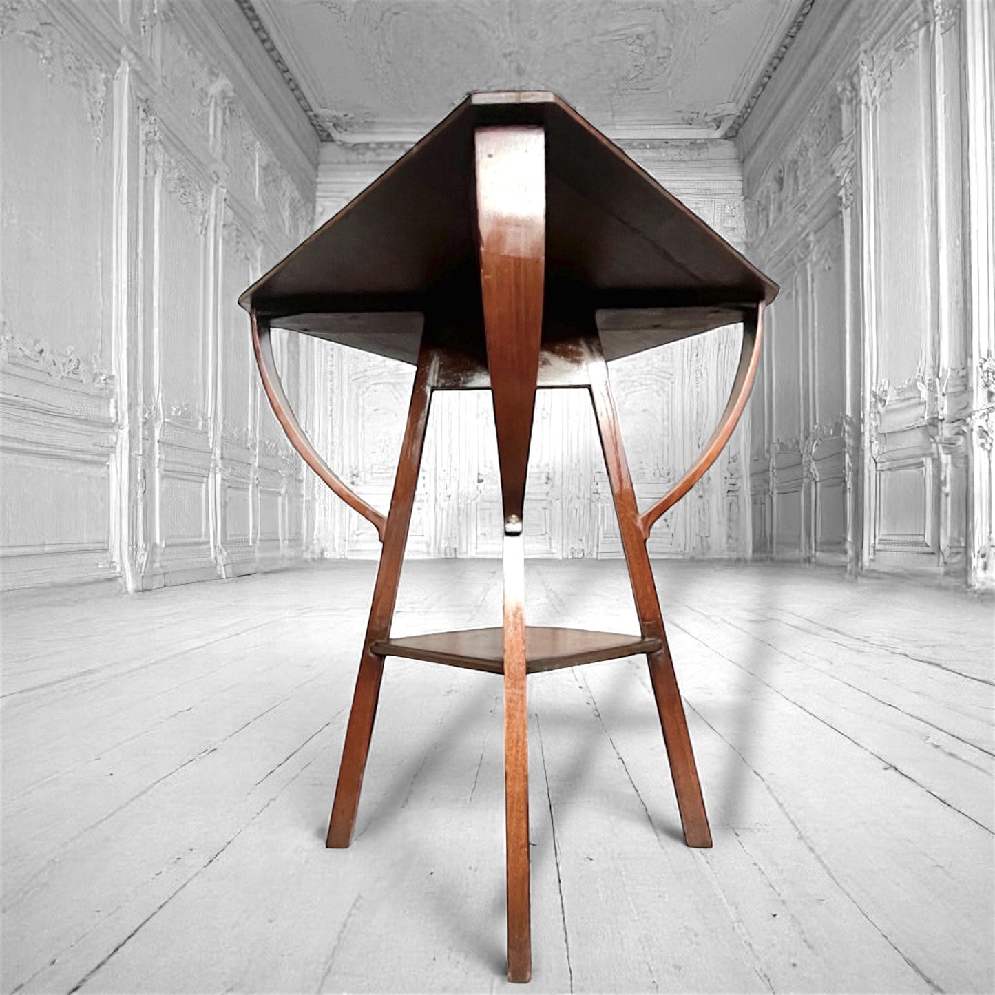 An arts and crafts / early modernist mahogany two-tiered occasional table c.1910.