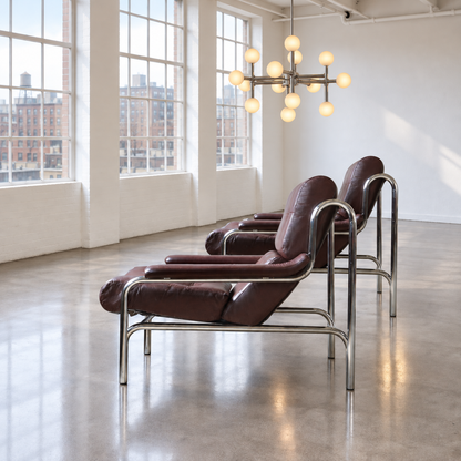 Pair of Pieff Mid Century Alpha Armchairs Tim Bates Oxblood Leather Chrome 1970s