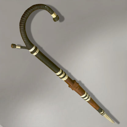 A rare and authentic African disguised sword cane, dated to c. 1920–40,