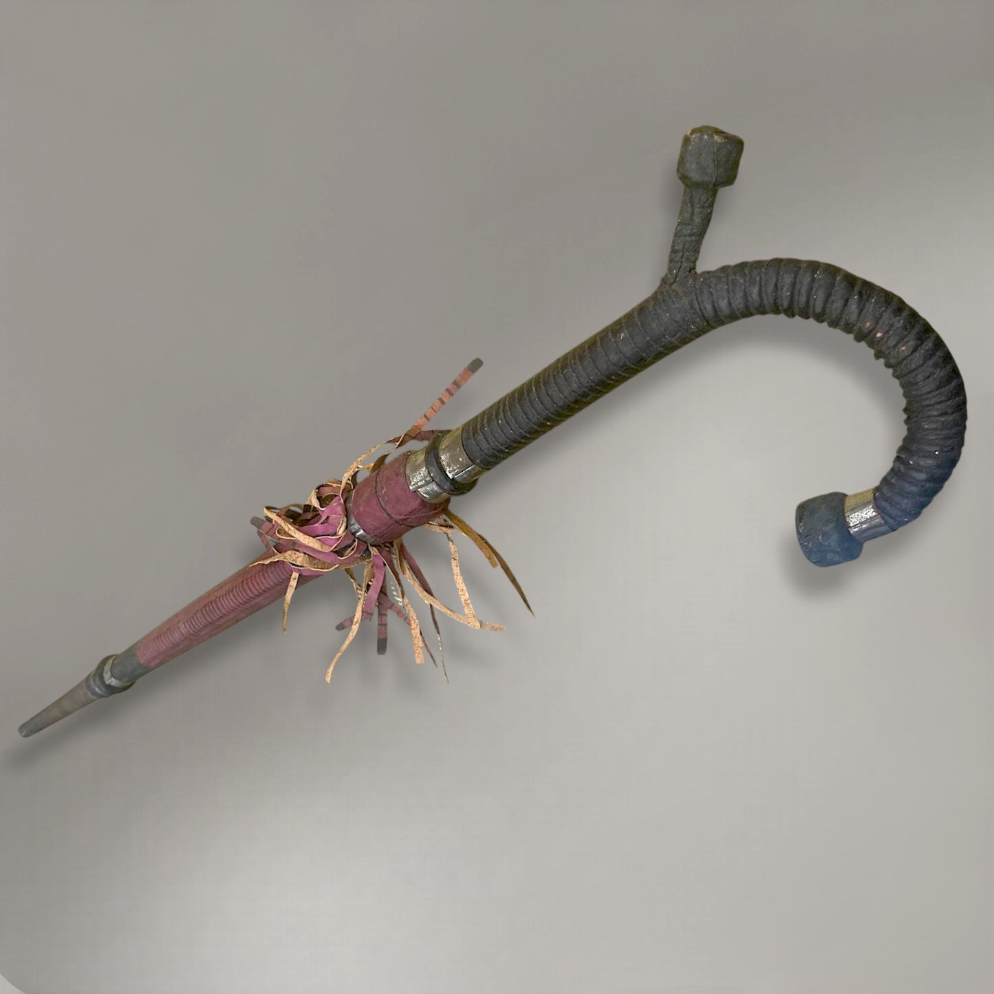 A rare and authentic African disguised sword cane, dated to c. 1920–40,