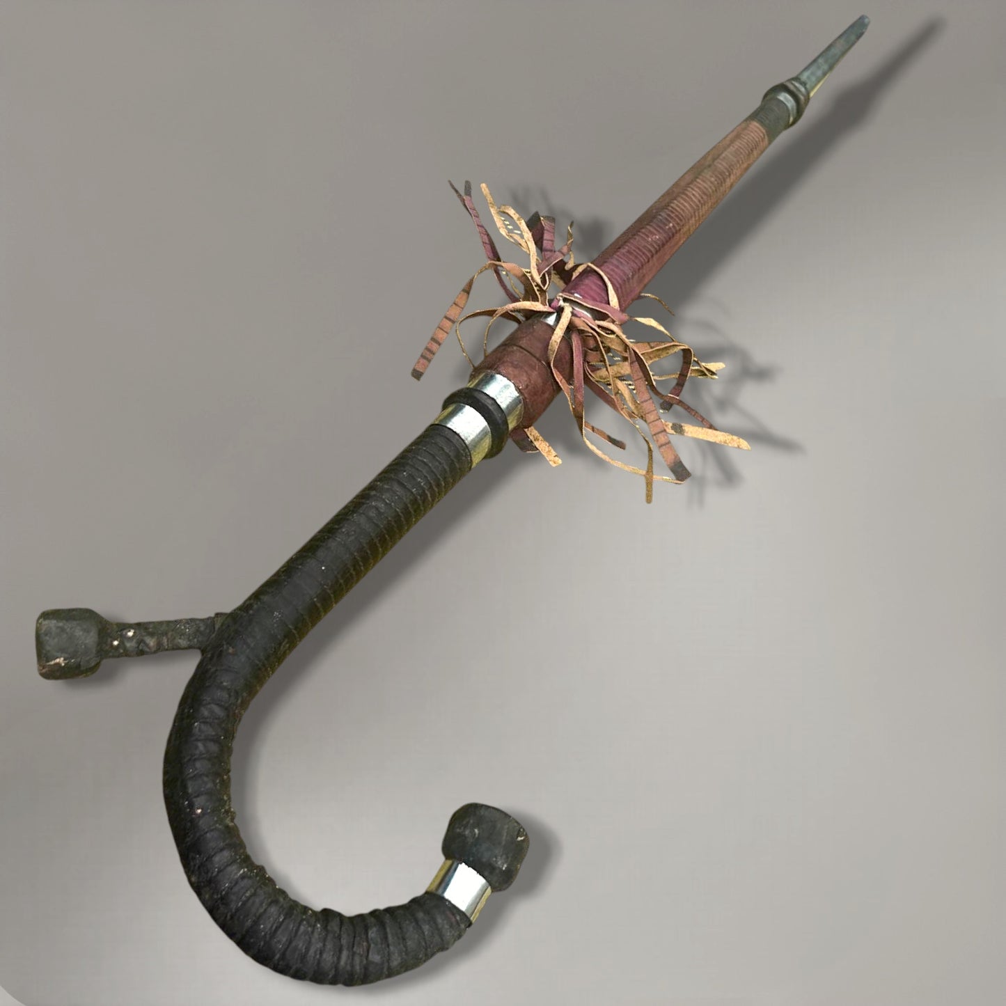 A rare and authentic African disguised sword cane, dated to c. 1920–40,