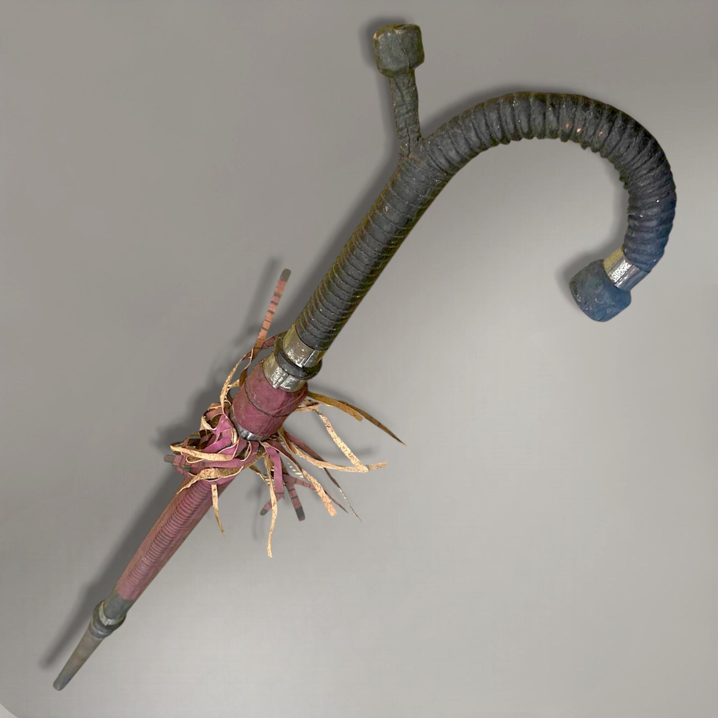 A rare and authentic African disguised sword cane, dated to c. 1920–40,