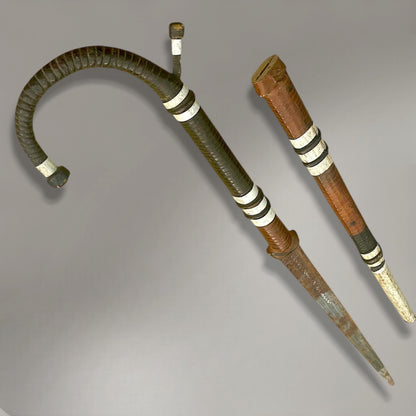 A rare and authentic African disguised sword cane, dated to c. 1920–40,