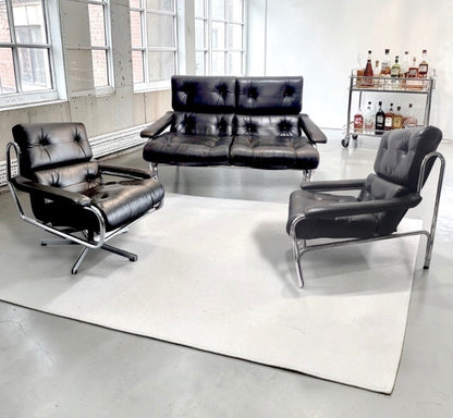 1970s Pieff Alpha lounge suite in original black leather with polished chrome frames, attributed to Tim Bates.