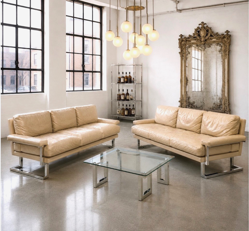 A rare pair of Pieff “Mandarin” three-seater sofas designed by Tim Bates, c.1970s.
