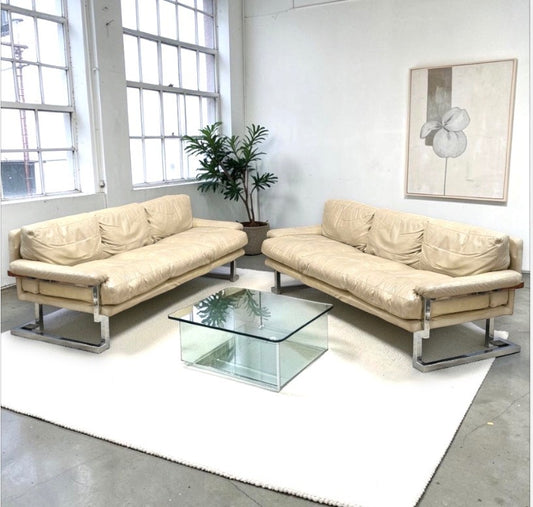 A rare pair of Pieff “Mandarin” three-seater sofas designed by Tim Bates, c.1970s.