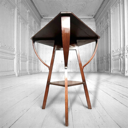 An arts and crafts / early modernist mahogany two-tiered occasional table c.1910.