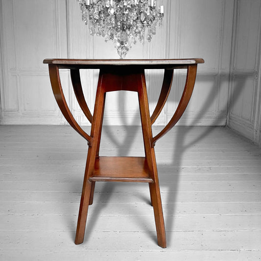 An arts and crafts / early modernist mahogany two-tiered occasional table c.1910.