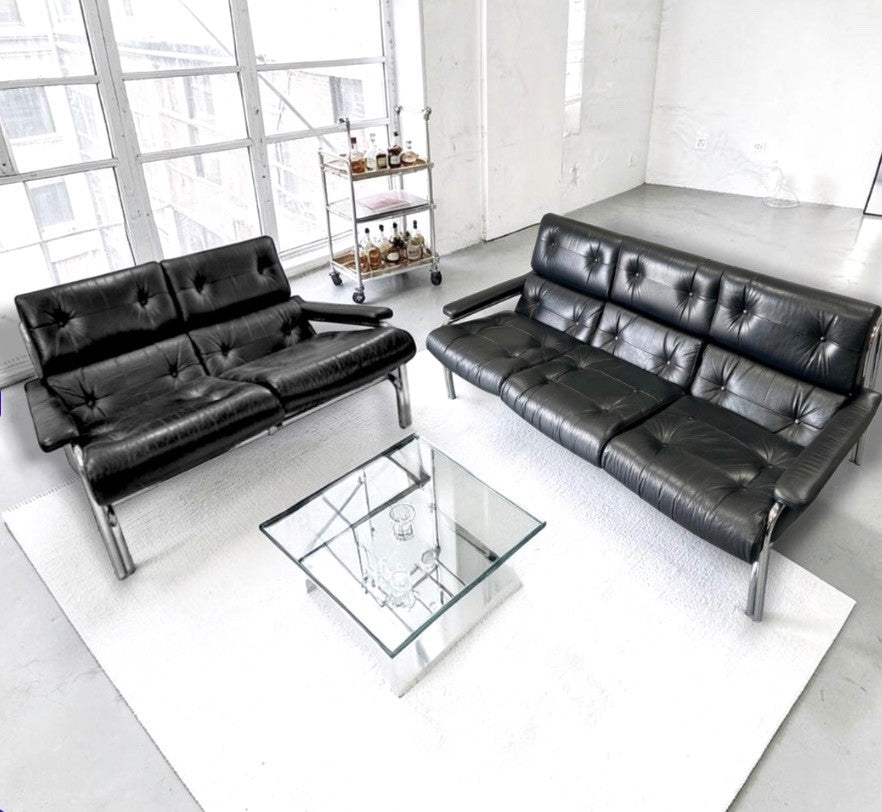 1970s Pieff Alpha lounge suite in original black leather with polished chrome frames, attributed to Tim Bates.