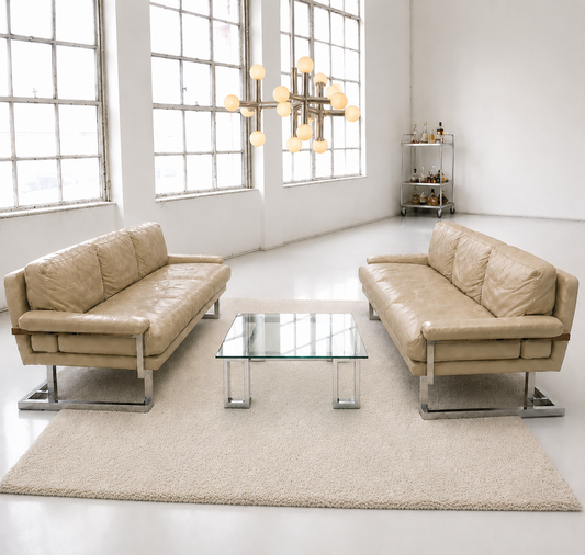 A rare pair of Pieff “Mandarin” three-seater sofas designed by Tim Bates, c.1970s.